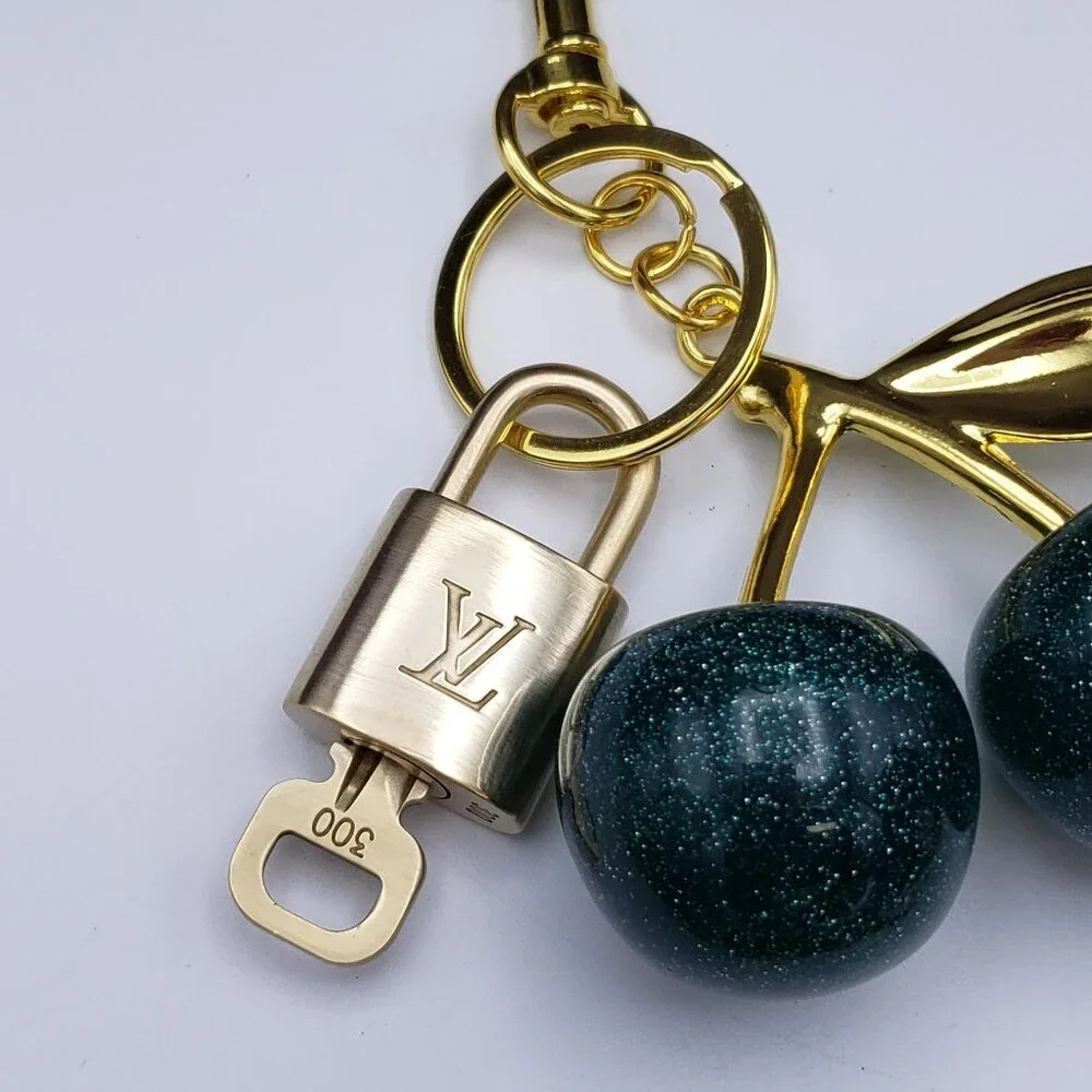 Authentic Louis Vuitton Lock & Key with Unbranded Apple Charm, Keychain